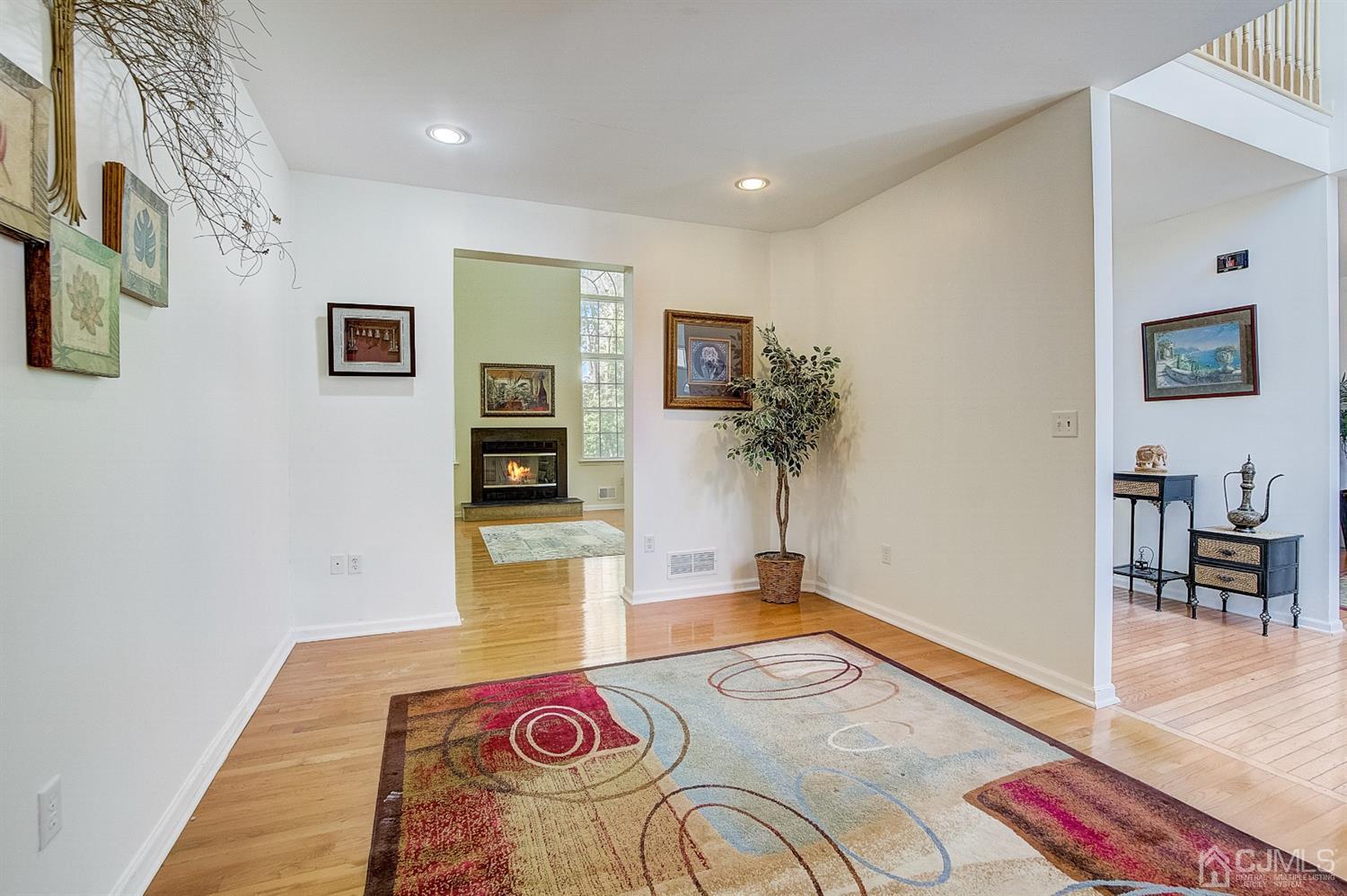 13 Revere Road Monmouth Junction, NJ 08852 - Photo 6 of 39 a living room with furniture and wooden floor