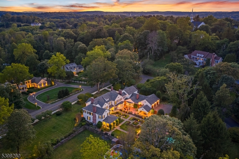 an aerial view of a house with a garden