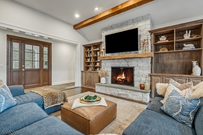 22 Talmage Road Mendham, NJ 07945 - Photo 13 of 46 a living room with furniture and a fireplace