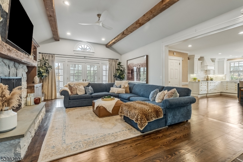 22 Talmage Road Mendham, NJ 07945 - Photo 16 of 46 a living room with furniture and a flat screen tv