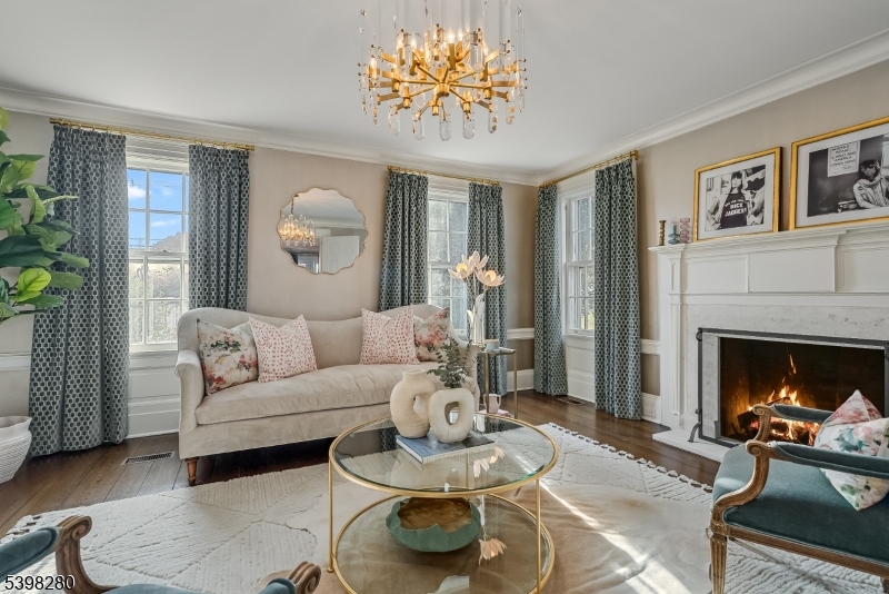 22 Talmage Road Mendham, NJ 07945 - Photo 29 of 46 a living room with furniture and a fireplace