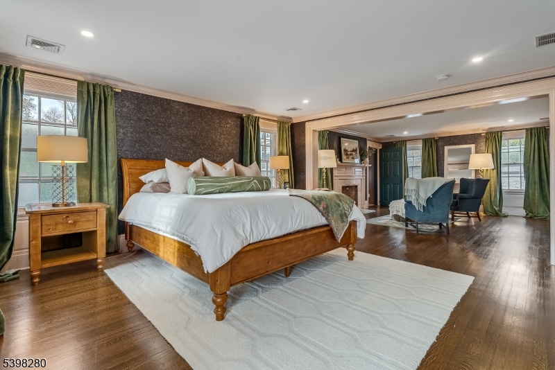 22 Talmage Road Mendham, NJ 07945 - Photo 38 of 46 a bedroom with a bed and wooden floor