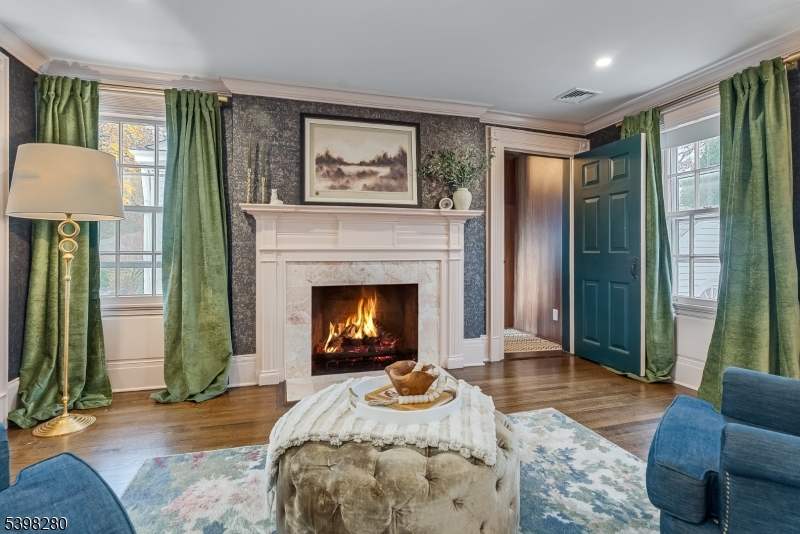 22 Talmage Road Mendham, NJ 07945 - Photo 39 of 46 a living room with furniture and a fireplace