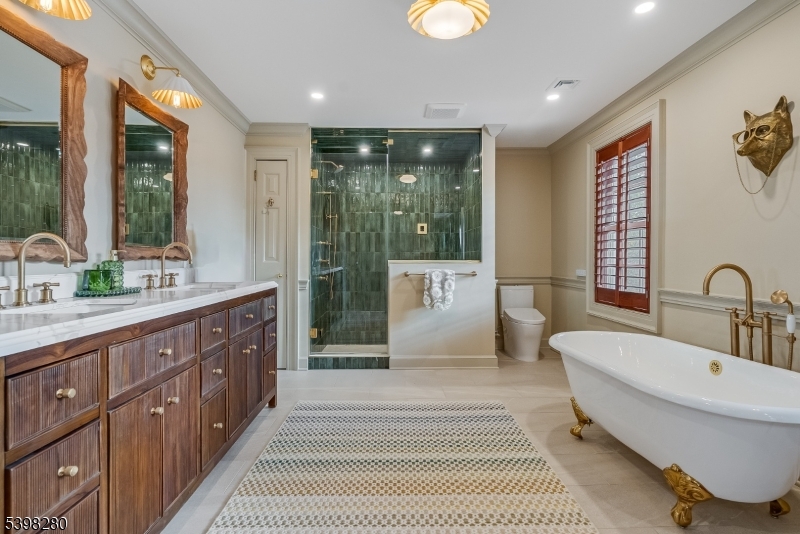 22 Talmage Road Mendham, NJ 07945 - Photo 42 of 46 a spacious bathroom with a double vanity sink and a large mirror
