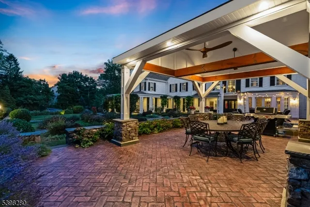 a patio with table and chairs