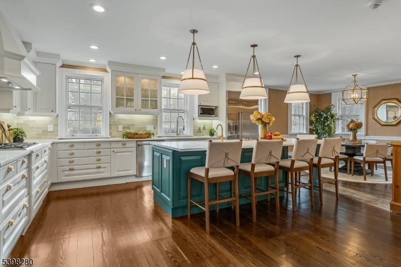 22 Talmage Road Mendham, NJ 07945 - Photo 9 of 46 a large kitchen with a table and chairs