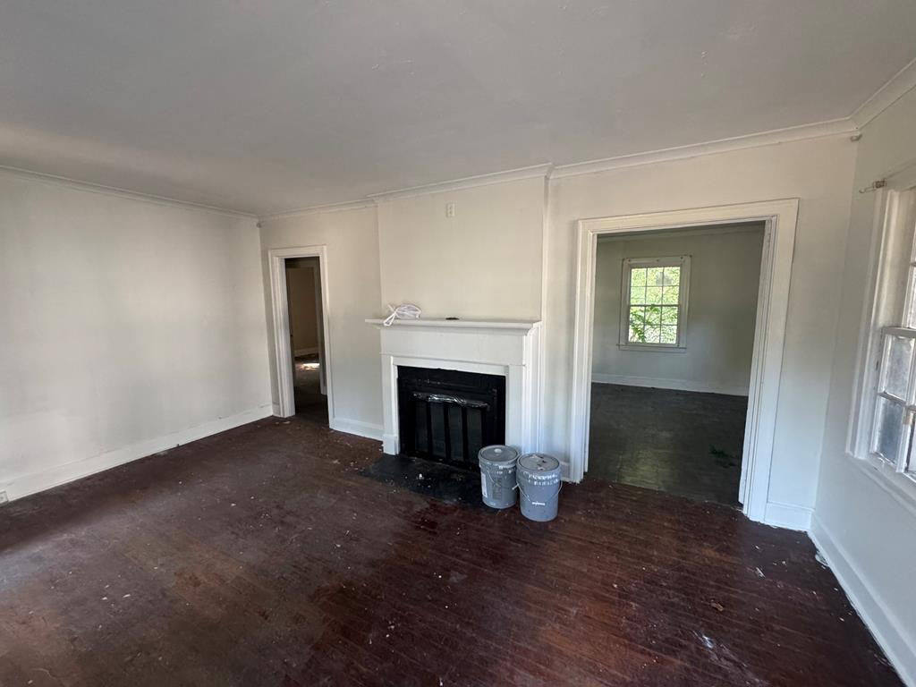 2916 Lee Street Columbus, GA 31903 - Photo 5 of 11 a view of a livingroom with a fireplace