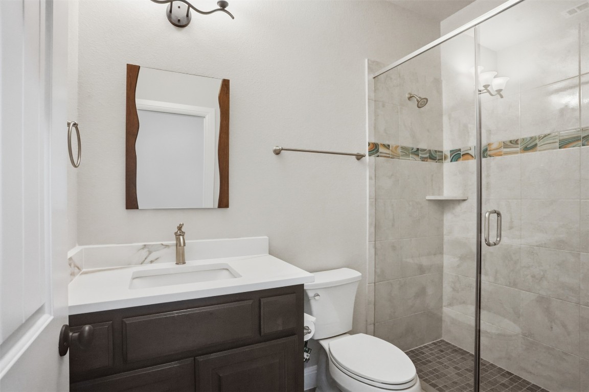 1441 River Vista Road Georgetown, TX 78628 - Photo 29 of 37 Full bath featuring vanity and a shower stall