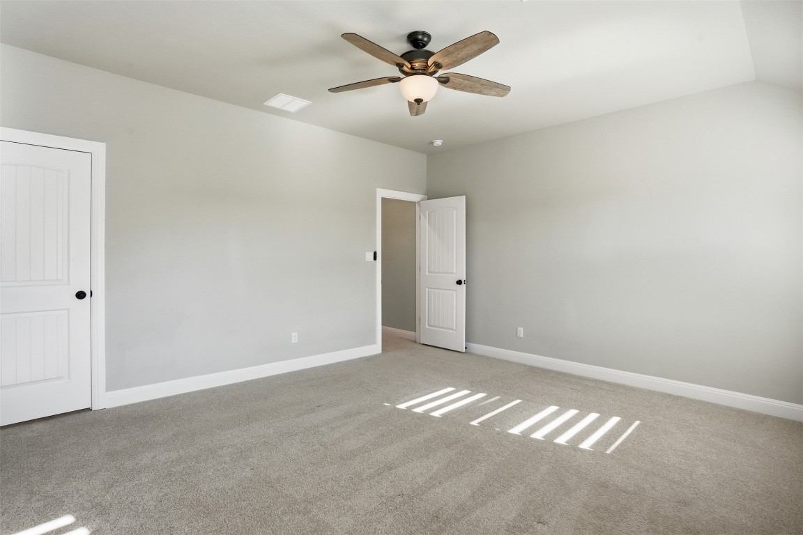 1441 River Vista Road Georgetown, TX 78628 - Photo 31 of 37 Upstairs bedroom is oversized featuring a ceiling fan, large walk in closet and private!