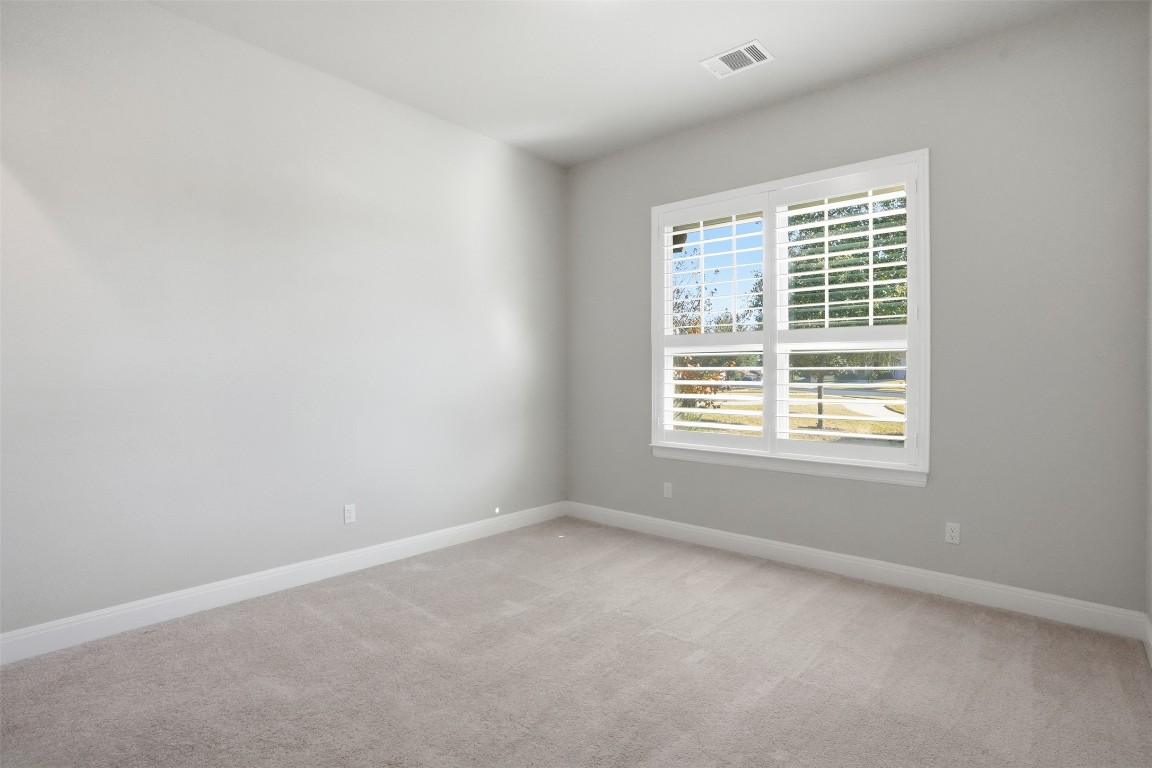 1441 River Vista Road Georgetown, TX 78628 - Photo 10 of 37 Front bedroom with full bath by this bedroom.