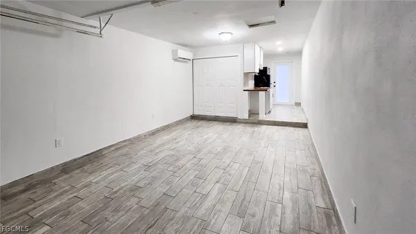 a view of a big room with wooden floor