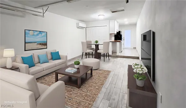 a living room with furniture and a table