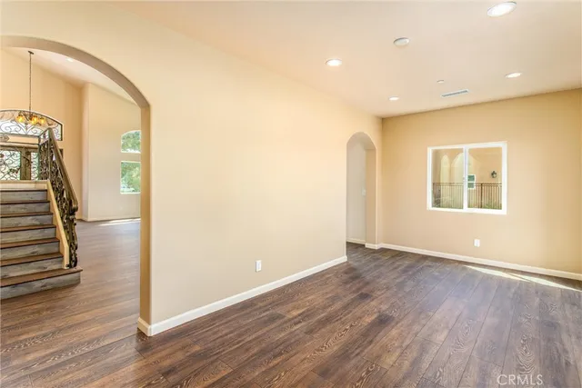 a room with a sink and a mirror