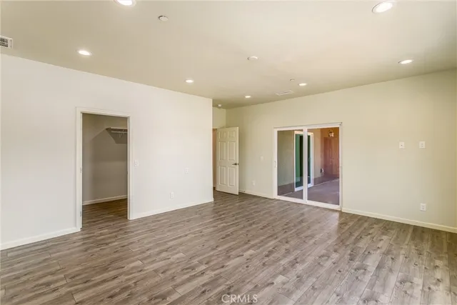 a view of a swimming pool with an outdoor space and seating area