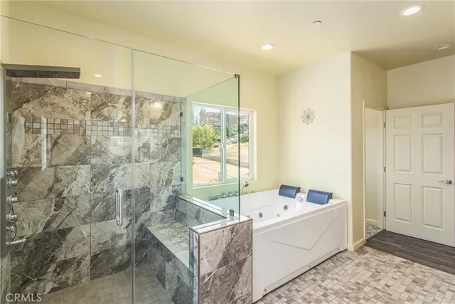 a view of pool with yard