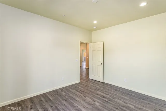 an aerial view of a house with a ocean view