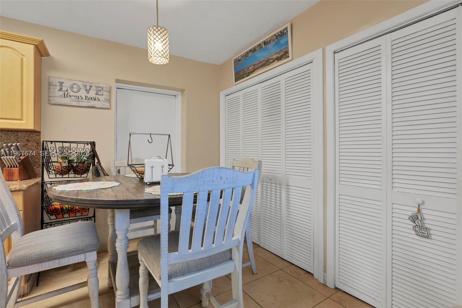1901 Southwest 90th Avenue Miami, FL 33165 - Photo 16 of 25 a view of a dining room with furniture