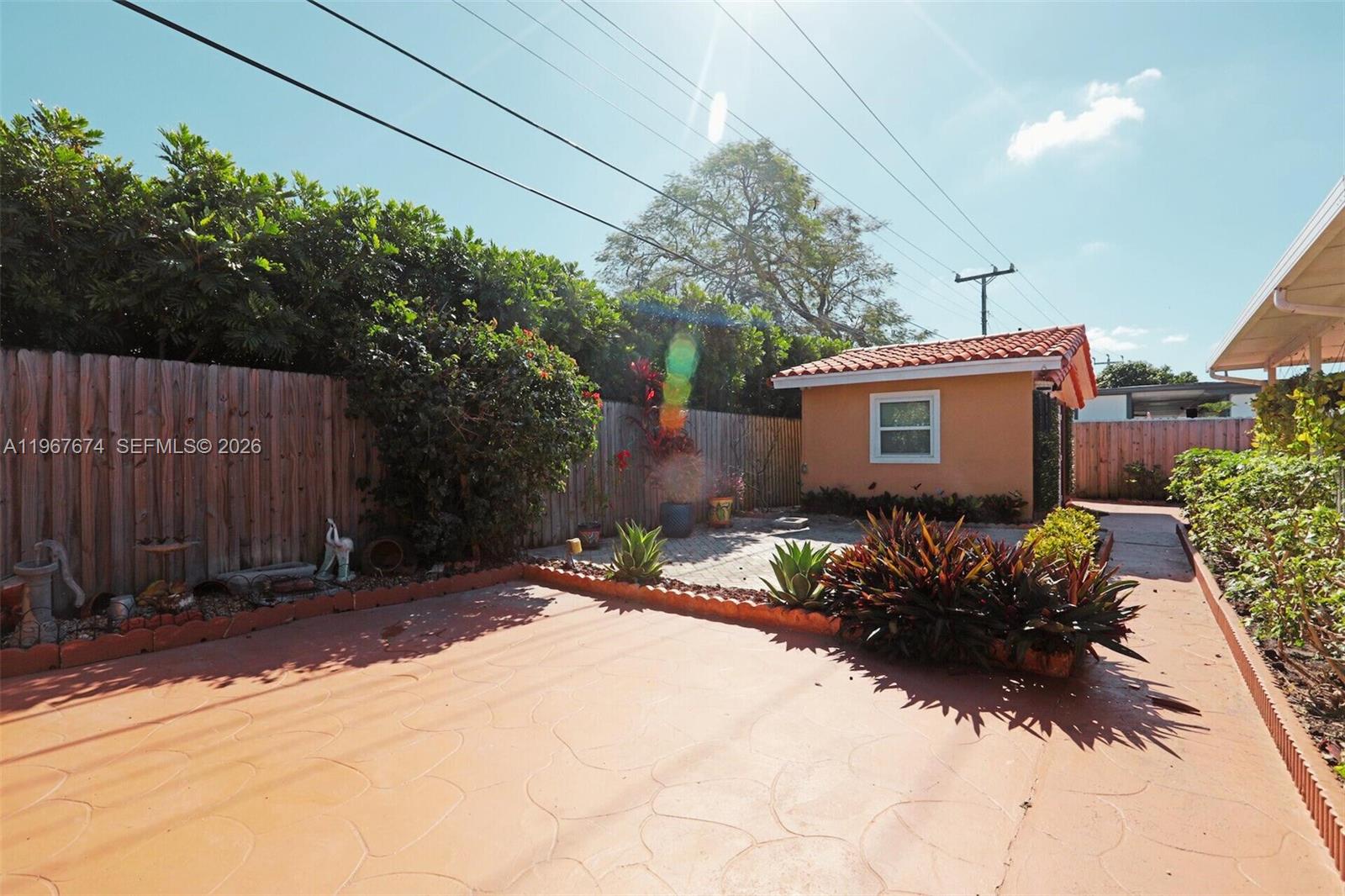 1901 Southwest 90th Avenue Miami, FL 33165 - Photo 20 of 25 a view of a house with a yard