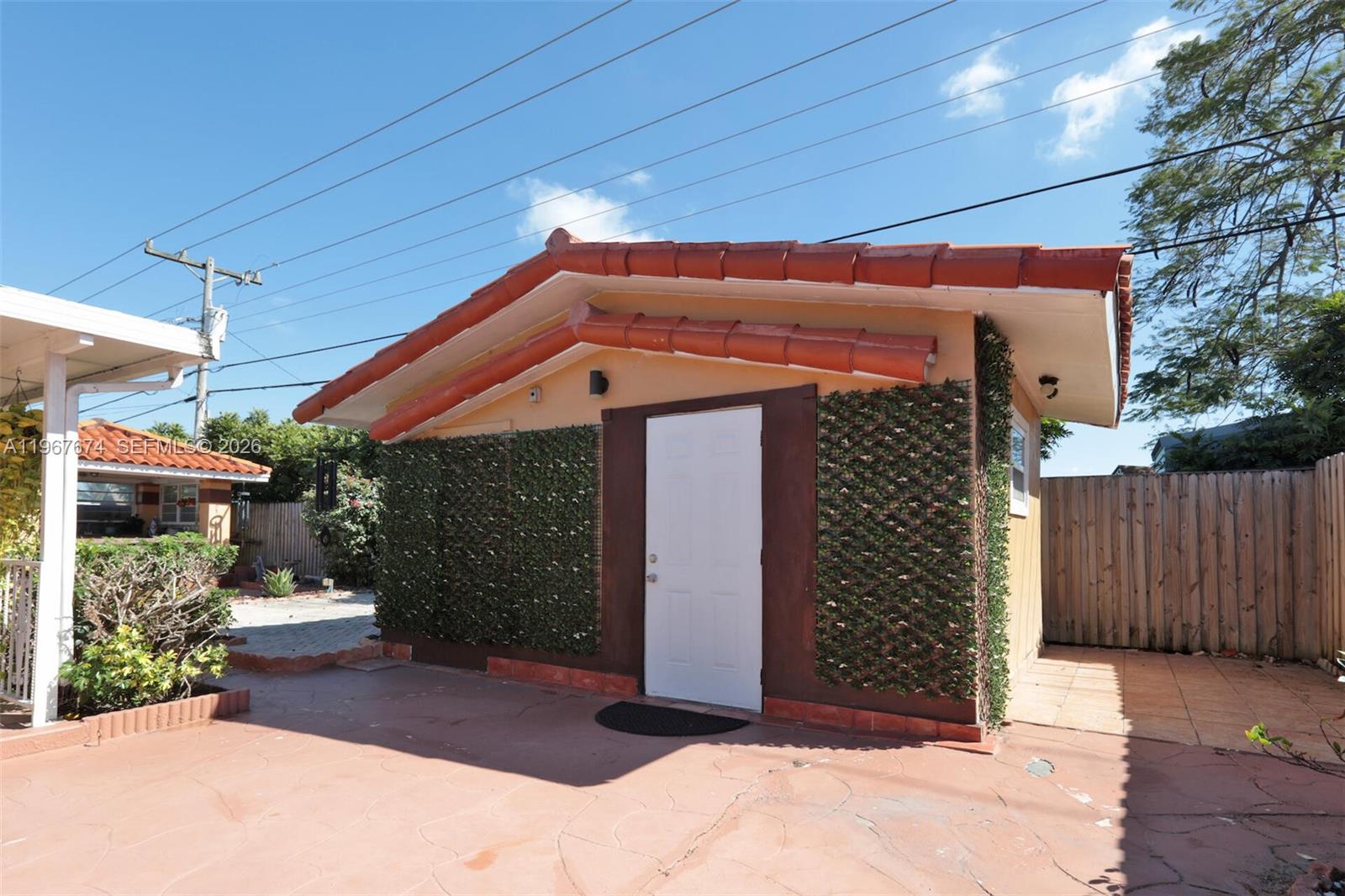 1901 Southwest 90th Avenue Miami, FL 33165 - Photo 21 of 25 a front view of a house with a yard