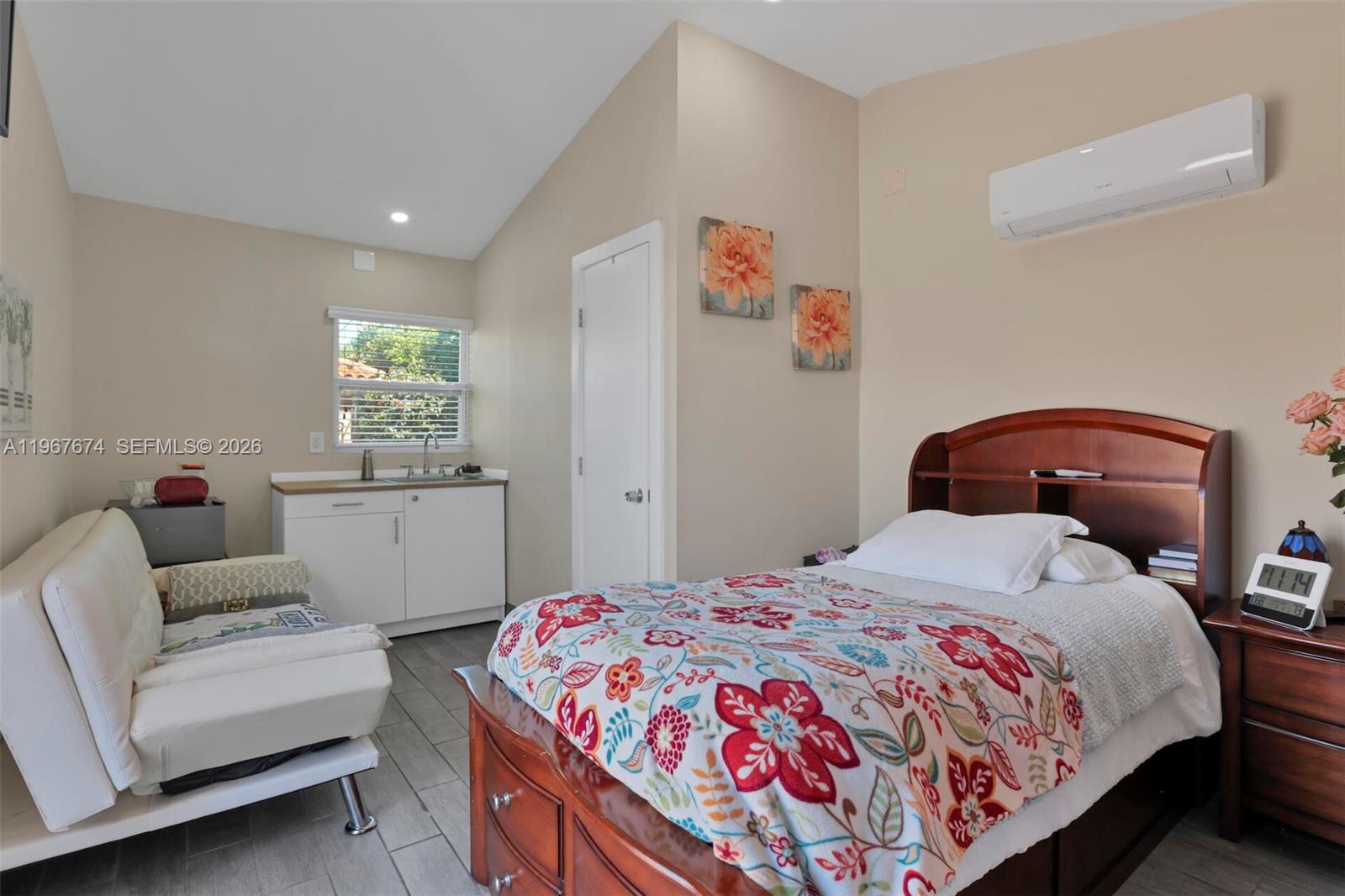 1901 Southwest 90th Avenue Miami, FL 33165 - Photo 22 of 25 a bedroom with a bed and a couch