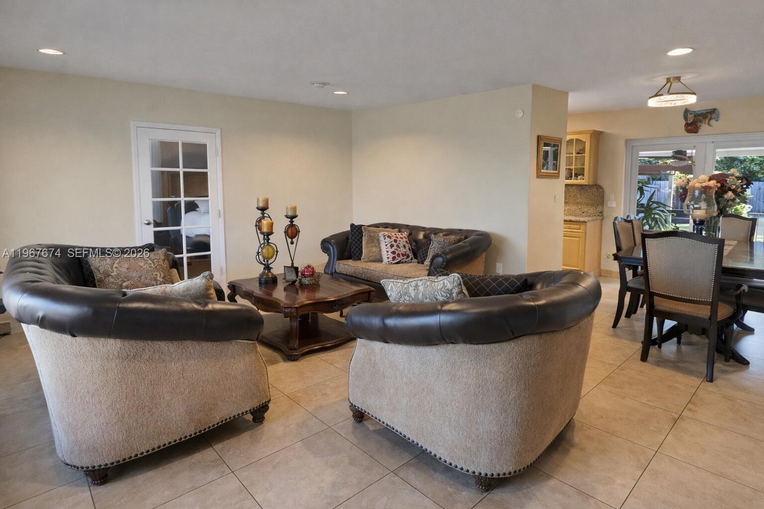 1901 Southwest 90th Avenue Miami, FL 33165 - Photo 3 of 25 a living room with furniture and a window