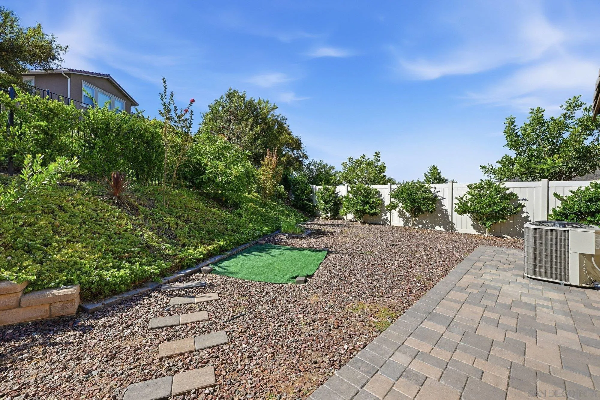 35833 Esperia Way Fallbrook, CA 92028 - Photo 38 of 46 Custom pavers on both sides of the yard and driveway