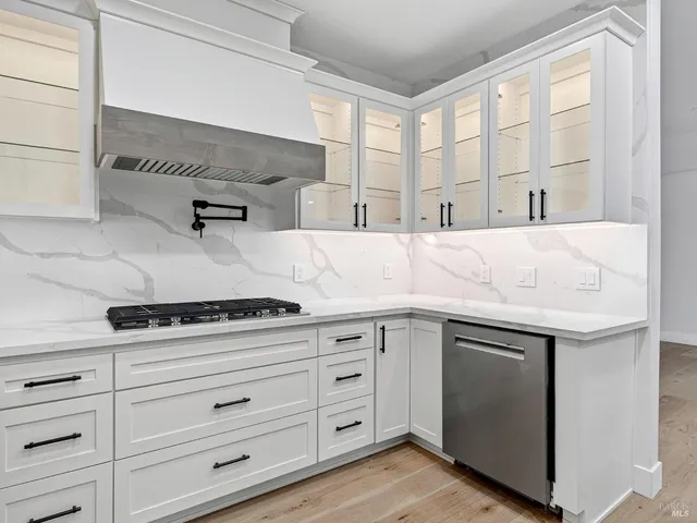 a bathroom with a toilet a sink and bathtub