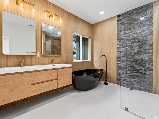 a bedroom with bed and window