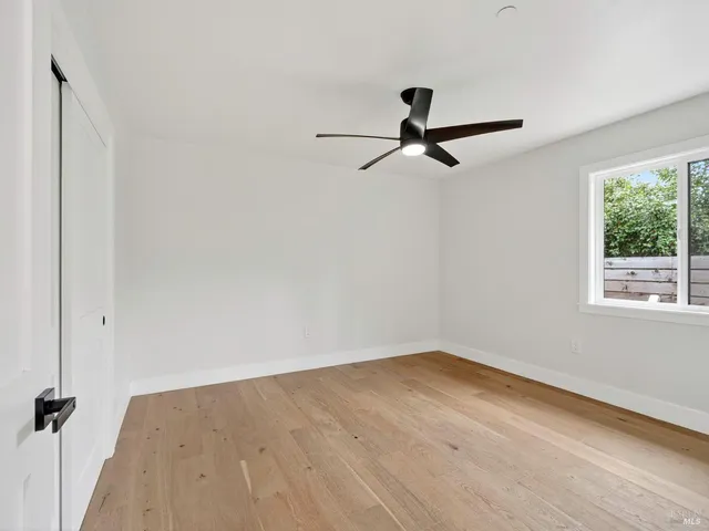 a bathroom with a toilet a sink and shower