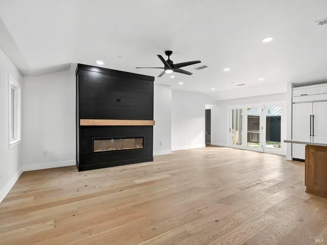 a kitchen with granite countertop a stove and a sink