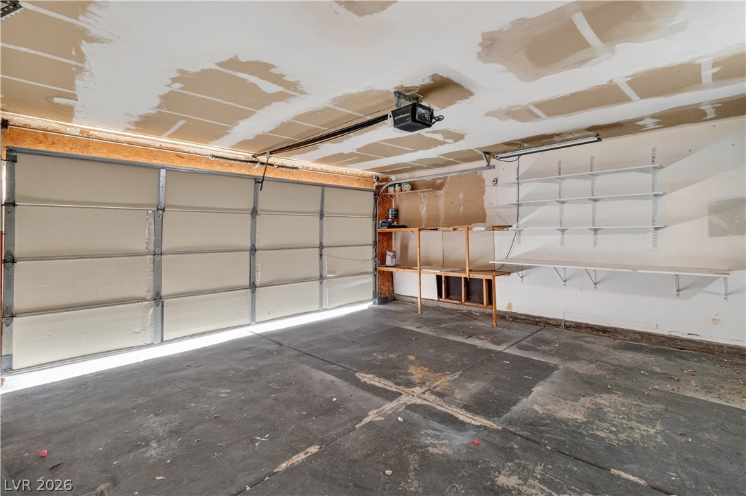 3156 Terrace View Drive Laughlin, NV 89029 - Photo 52 of 94 Functional garage offering ample storage and an automated door for convenient access.