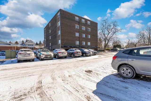 a car parked in front of a building