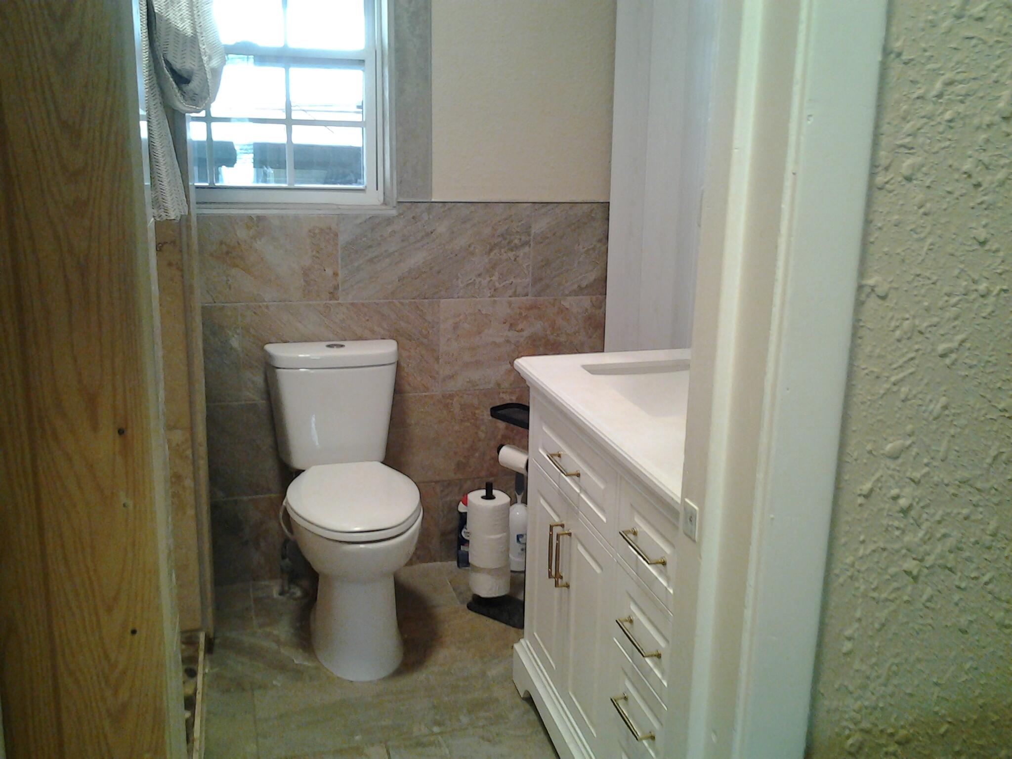 500 8th Street O'Donnell, TX 79351 - Photo 8 of 14 a bathroom with a sink toilet and window