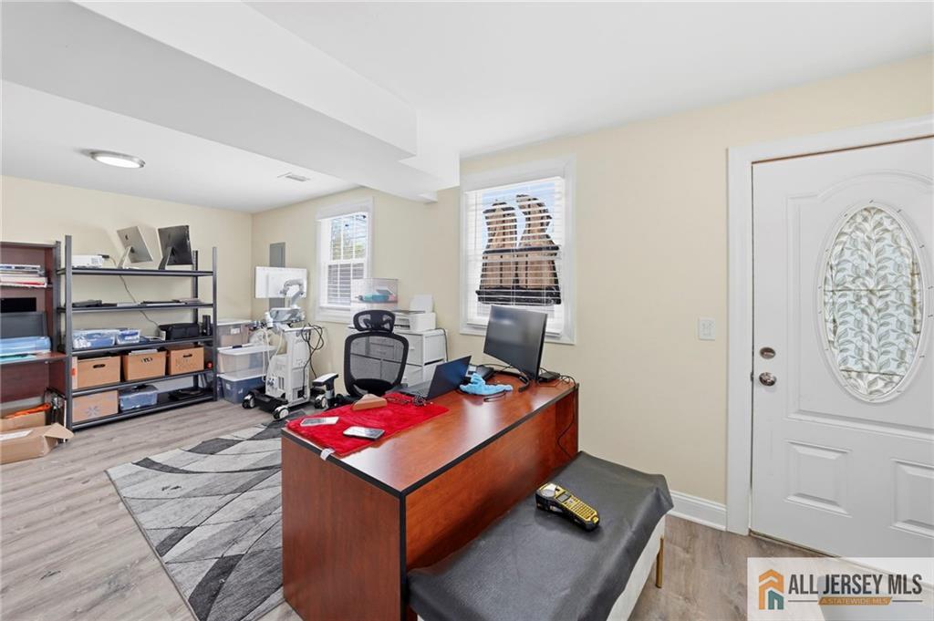 1084 Stelton Road Piscataway, NJ 08854 - Photo 13 of 20 a room with furniture and window