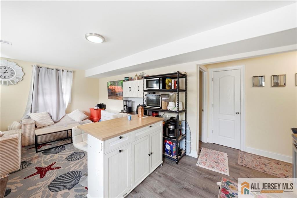 1084 Stelton Road Piscataway, NJ 08854 - Photo 14 of 20 a view of a kitchen with workspace and a window