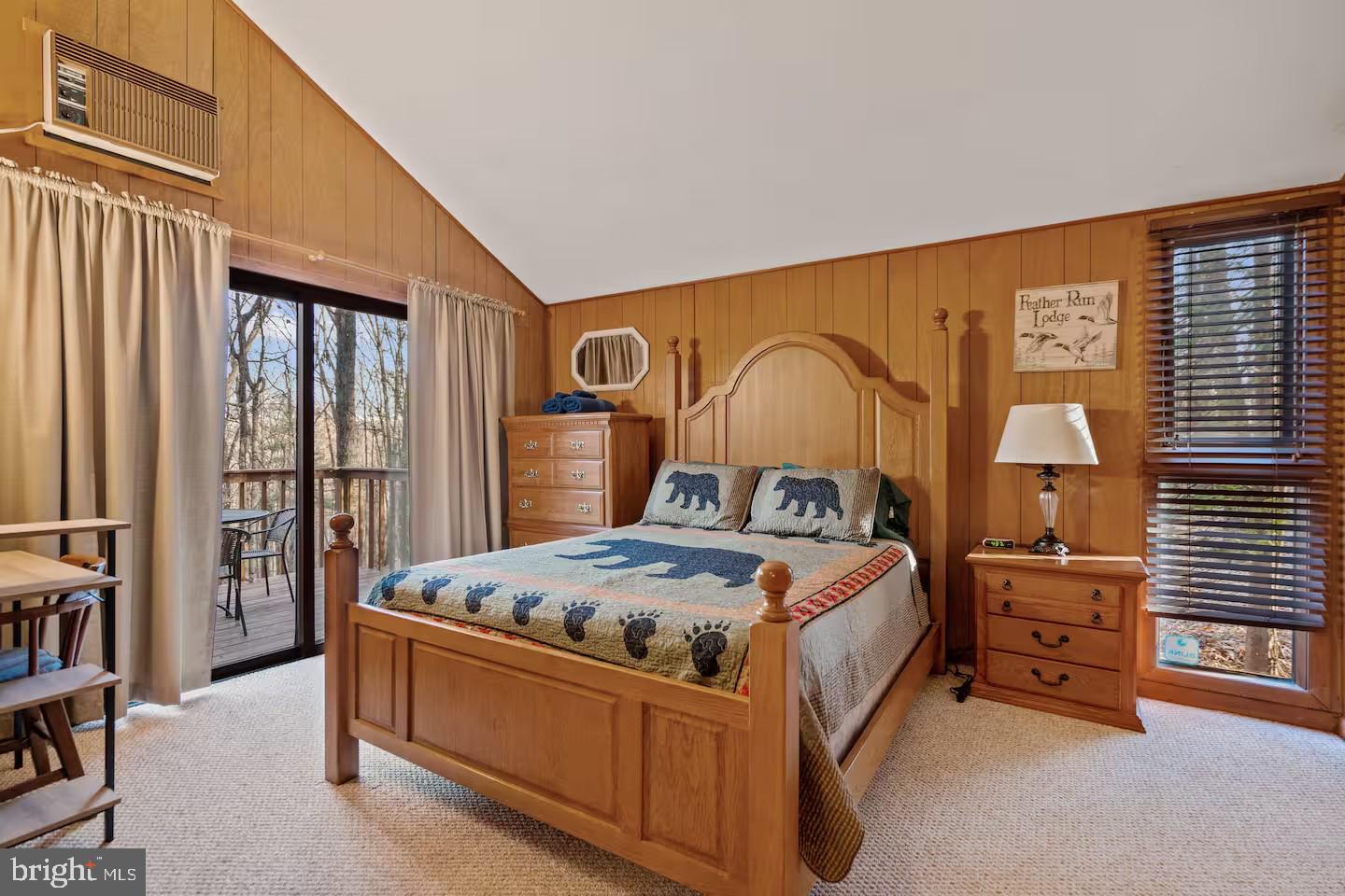 170 Whipporwill Way Berkeley Springs, WV 25411 - Photo 8 of 32 a bed sitting in a room next to a window
