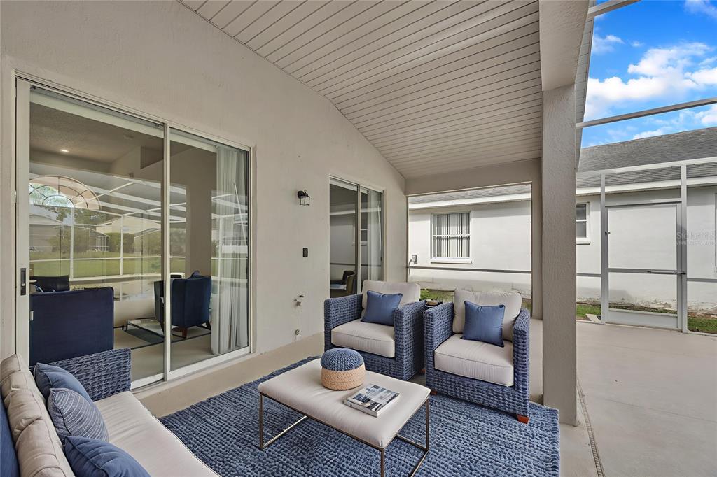 1047 Durango Loop Street Davenport, FL 33897 - Photo 25 of 35 a living room with furniture and a window