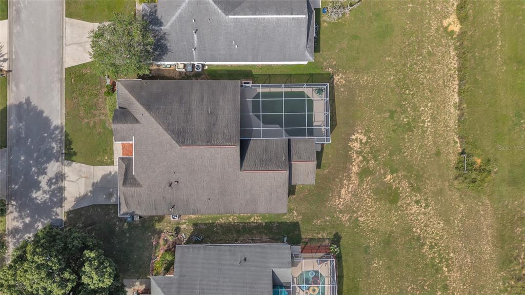 1047 Durango Loop Street Davenport, FL 33897 - Photo 30 of 35 aerial view of a house with a yard