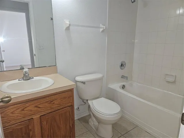 a view of an empty room and closet