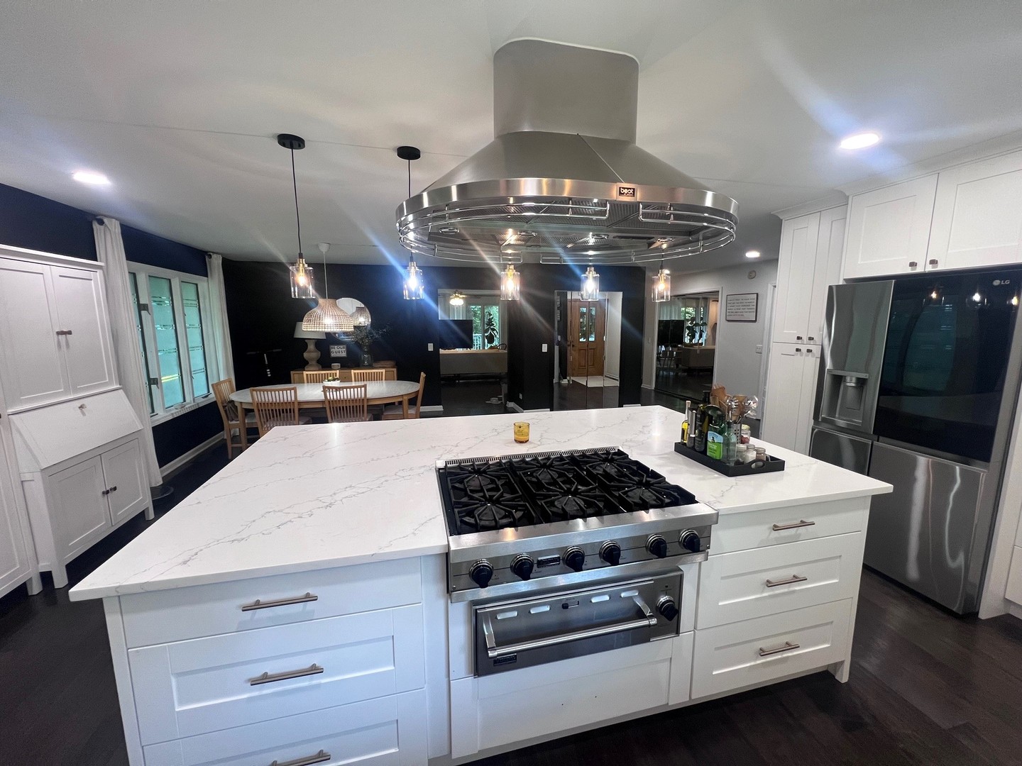 12970 Briody Way Genoa, IL 60135 - Photo 12 of 45 a kitchen with stainless steel appliances kitchen island a stove and a refrigerator