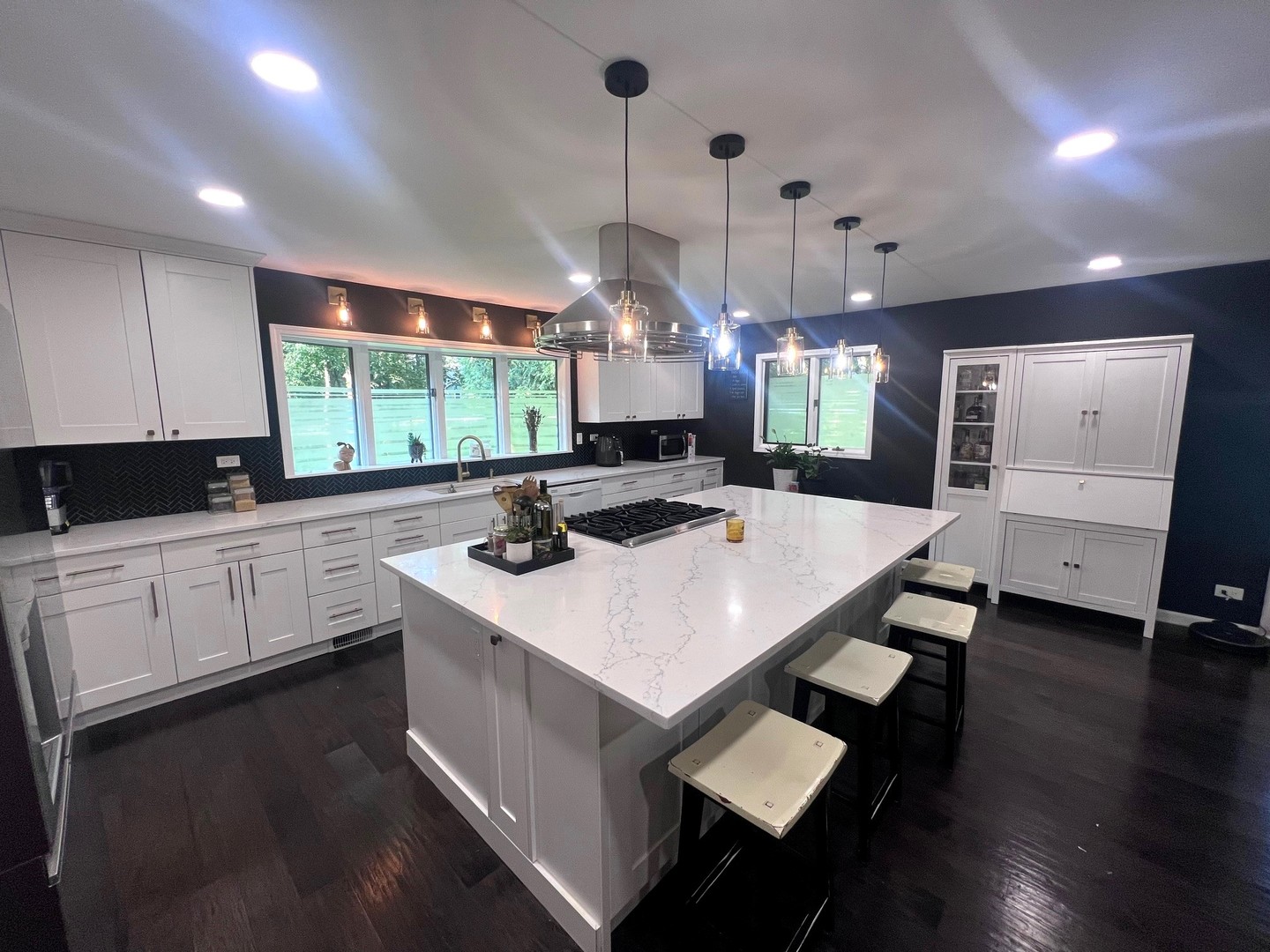 12970 Briody Way Genoa, IL 60135 - Photo 14 of 45 a kitchen with sink refrigerator and large window