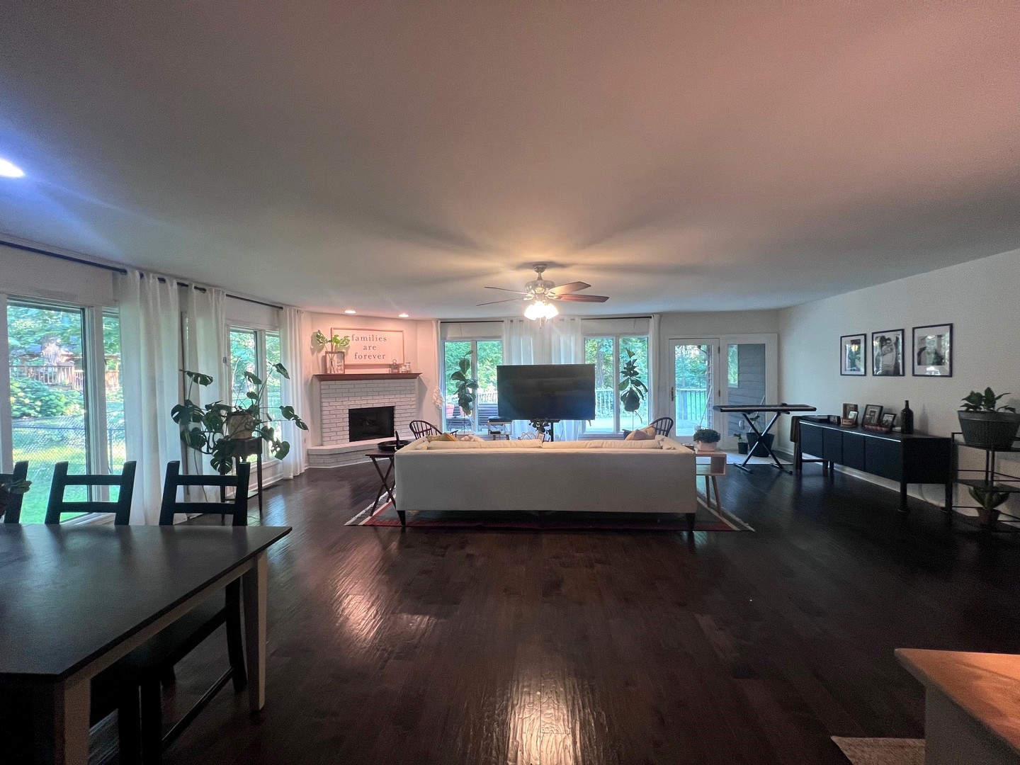 12970 Briody Way Genoa, IL 60135 - Photo 16 of 45 a living room with fireplace furniture and a wooden floor