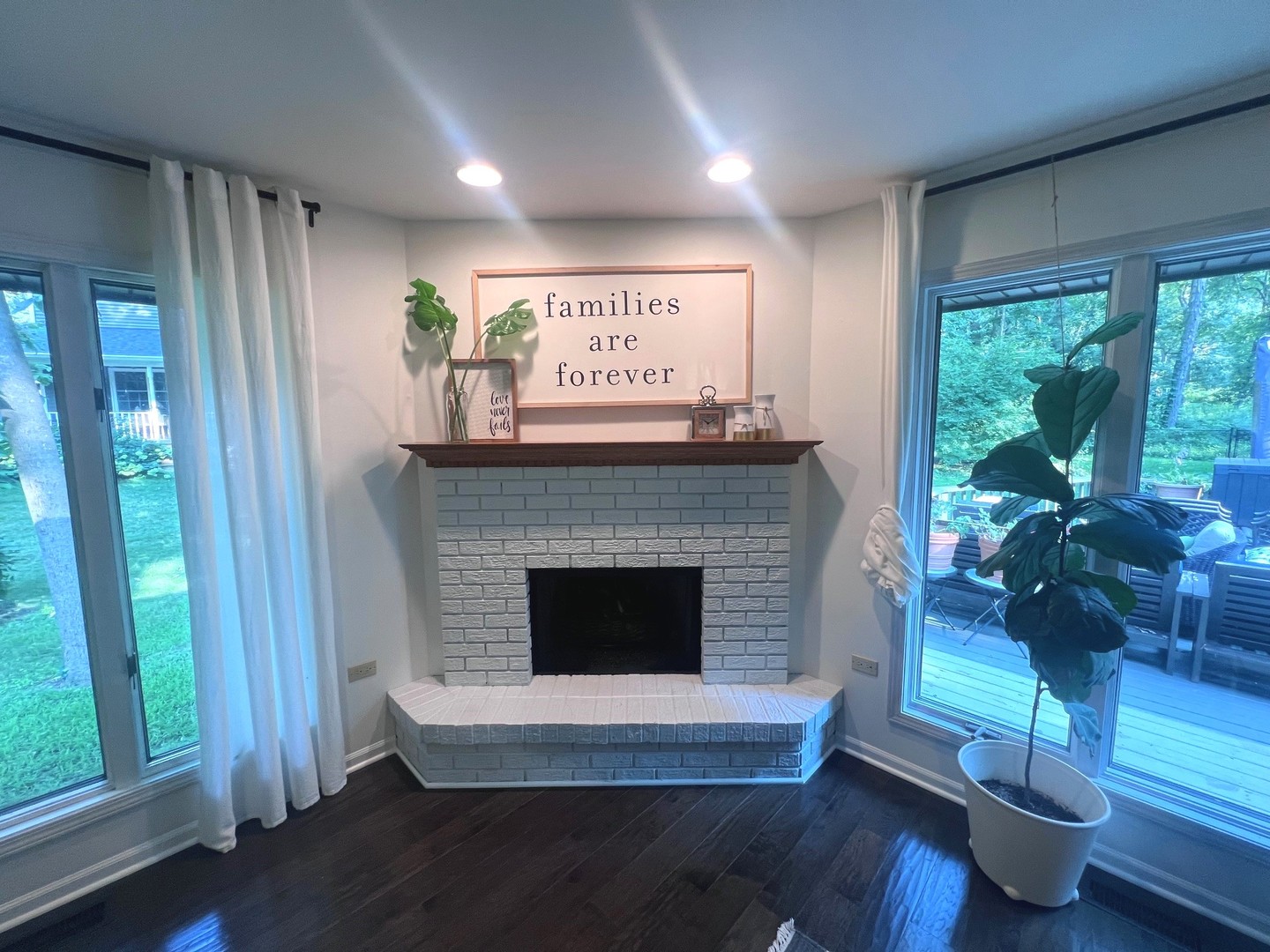 12970 Briody Way Genoa, IL 60135 - Photo 19 of 45 a living room with furniture and a fireplace