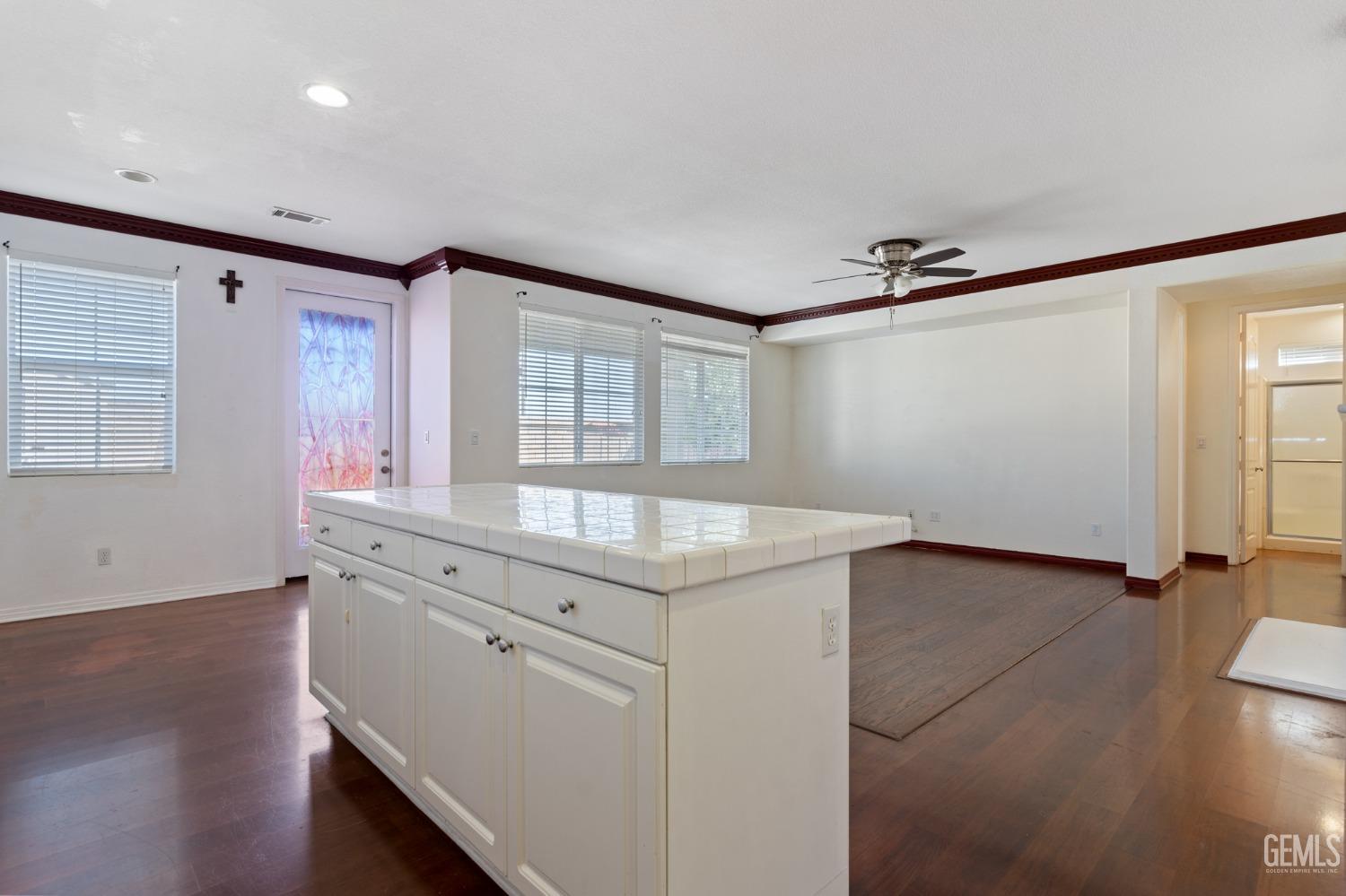 Undisclosed Address Bakersfield, CA 93306 - Photo 14 of 30 wooden floor in an empty room with a window