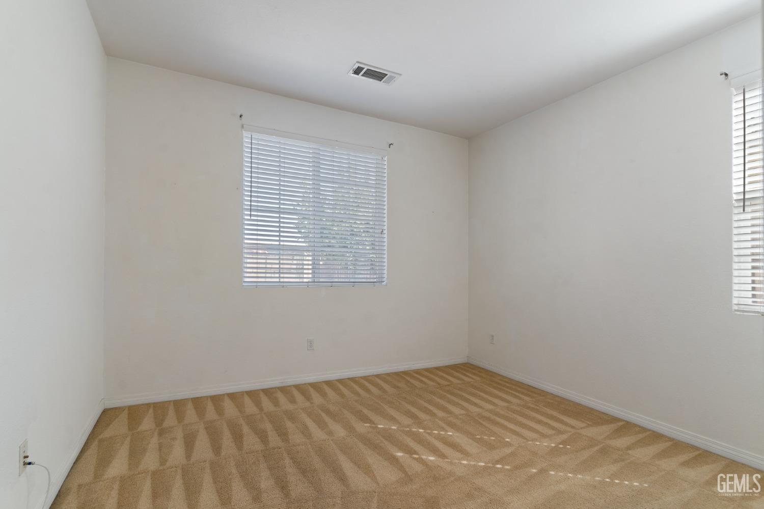 Undisclosed Address Bakersfield, CA 93306 - Photo 17 of 30 an empty room with a window