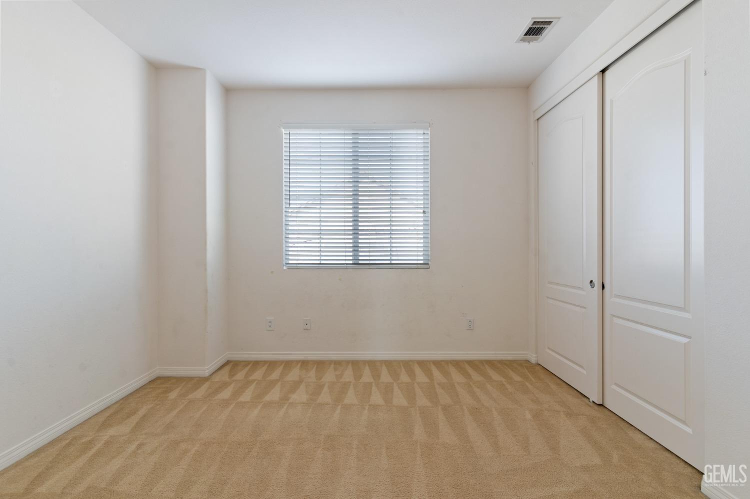 Undisclosed Address Bakersfield, CA 93306 - Photo 19 of 30 an empty room with a window