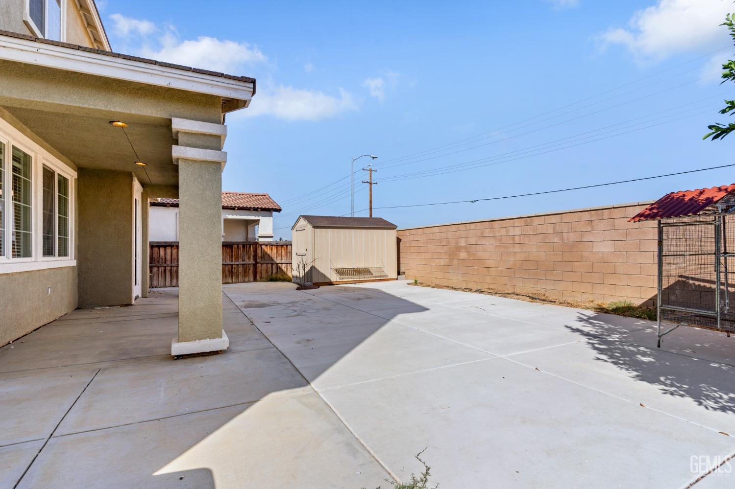 Undisclosed Address Bakersfield, CA 93306 - Photo 30 of 30 a spacious bathroom with a sink and a mirror