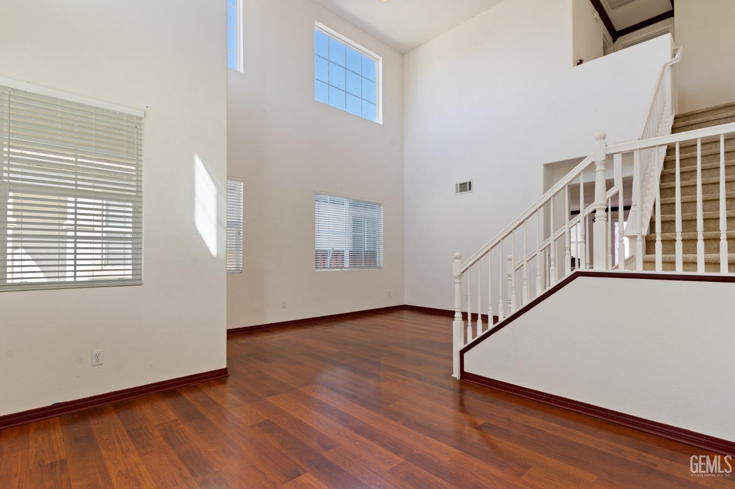 Undisclosed Address Bakersfield, CA 93306 - Photo 5 of 30 a view of an entryway with wooden floor