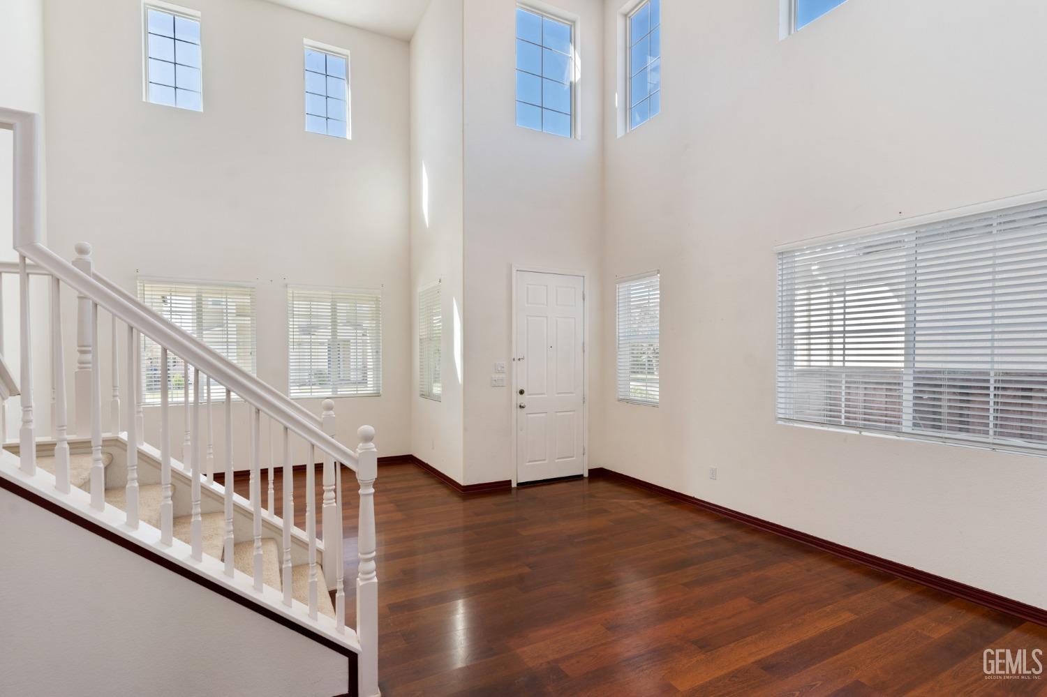 Undisclosed Address Bakersfield, CA 93306 - Photo 6 of 30 a view of an entryway with wooden floor
