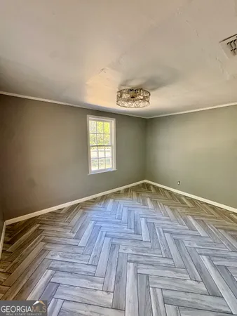 a bathroom with a shower a toilet and a sink